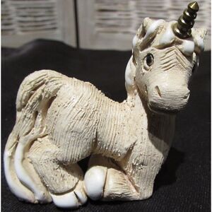 Artesania Rinconada unicorn figurine laying down vintage gold horn